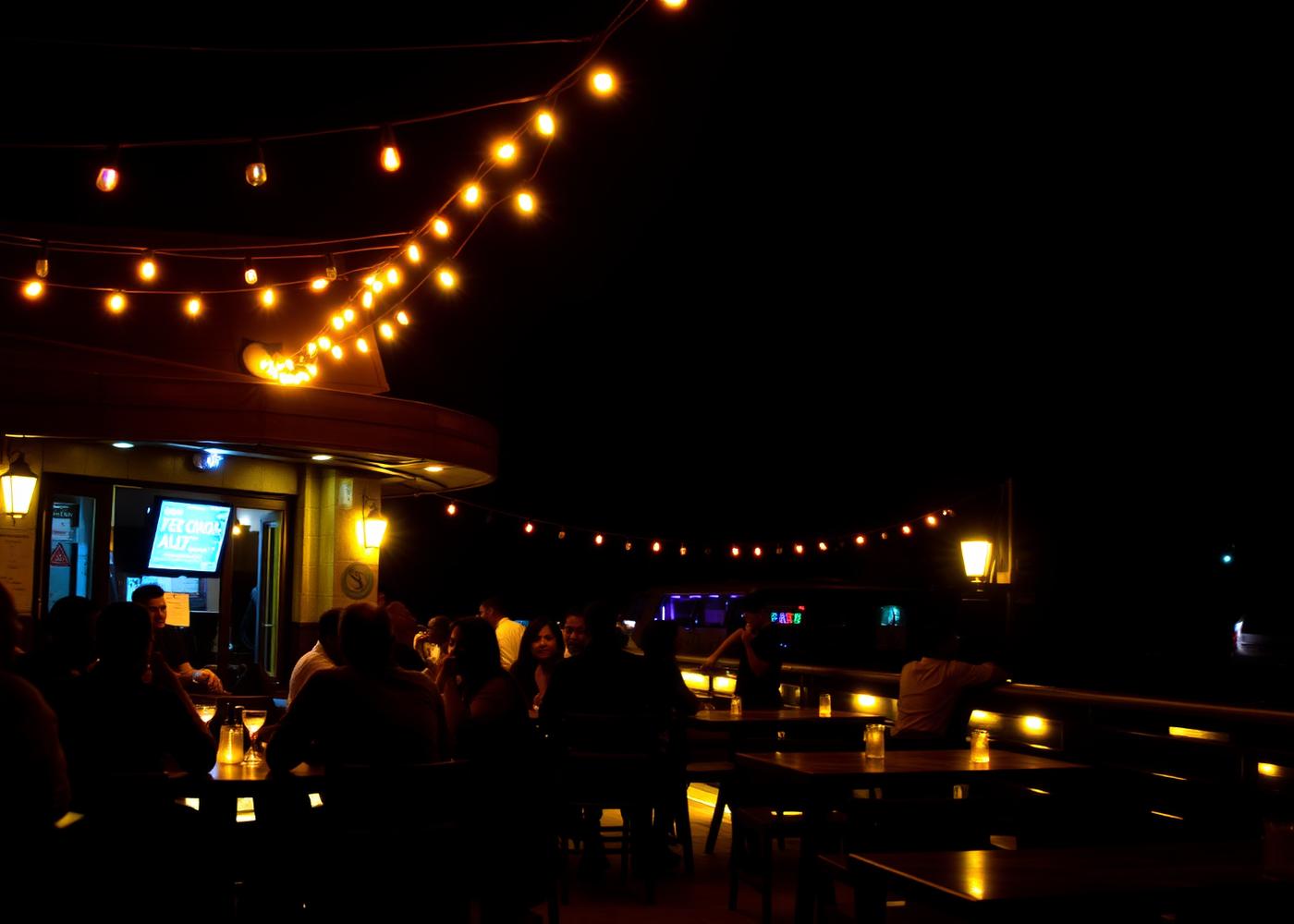 Guests enjoying the terrace at Shadows in the evening